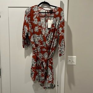 Orange, Black and White floral romper XXL NWT